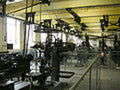 Machines in motive power room with power relay system on ceiling in Bradford Industrial Museum, author Linda Spashett Machines in motive power room with power relay system on ceiling in Bradford Industrial Museum, author Linda Spashett